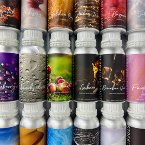 Collection of various stock fragrance bottles with colorful labels on a gray background