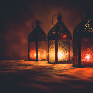 colorful candle lanterns lit at night; https://cdn.shopify.com/videos/c/o/v/9495f354639e4a4eac9fa8c747df0db6.mp4