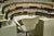 perfumers desk surrounded by glass vials