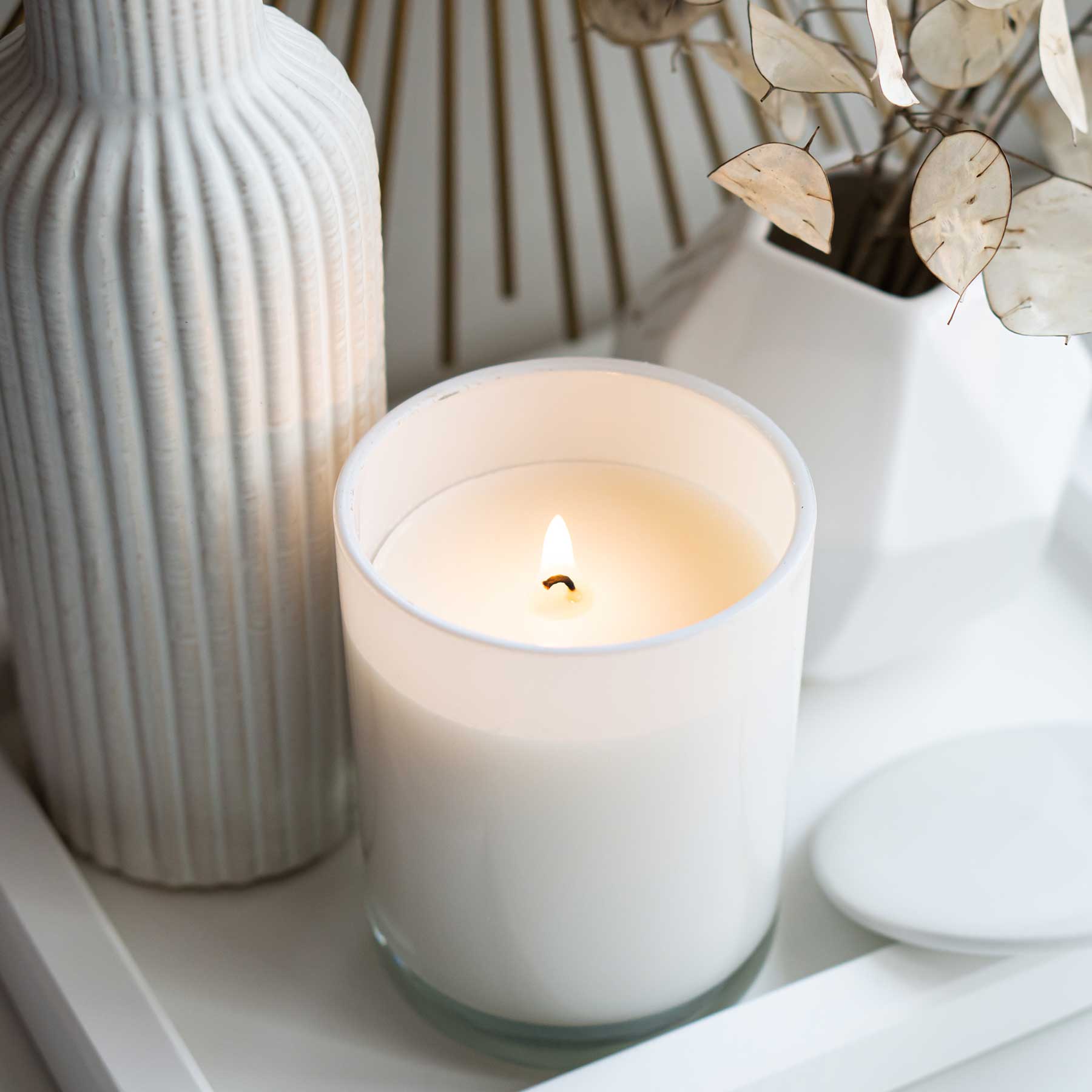 Research and analysis β lit candle and tabletop decor