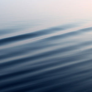 close up of smooth blue water surface with ripples; https://cdn.shopify.com/videos/c/o/v/1e043d0730fe4d73bad0393220f3de5a.mp4