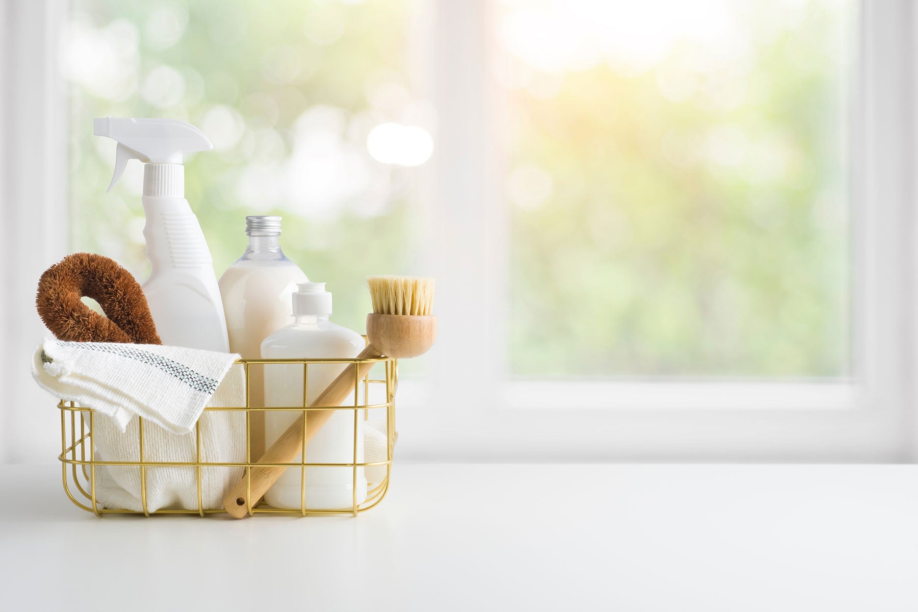 basket with household cleaning products