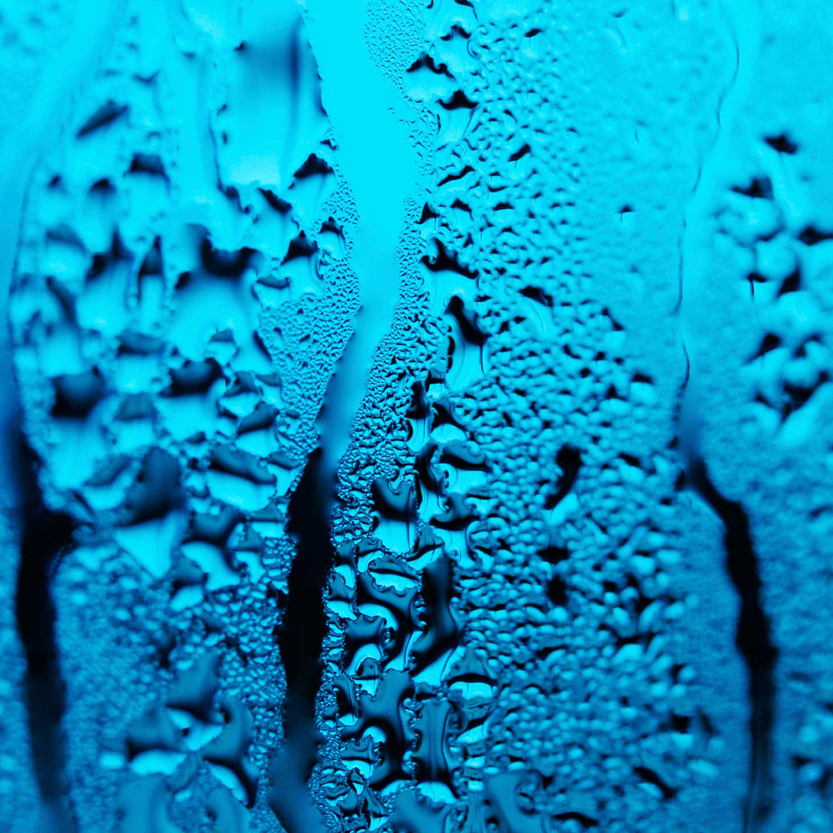 close up of blue condensation water droplets; https://cdn.shopify.com/videos/c/o/v/423a966324dc4d86b0f7d4de3ef763e3.mp4