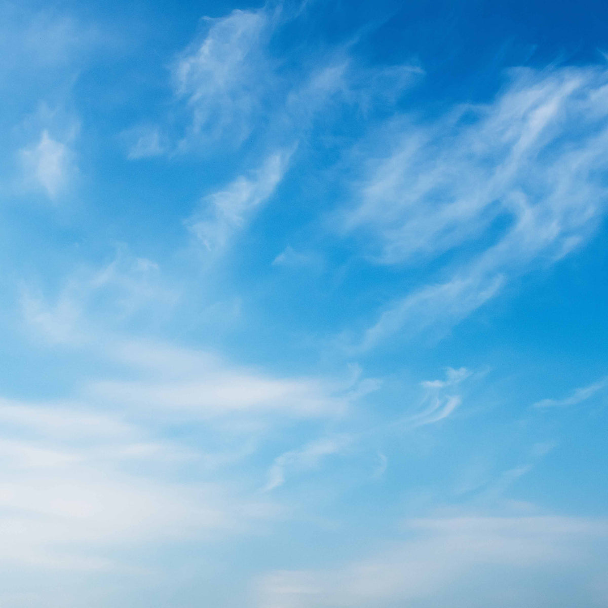 white cirrus clouds in bright blue sky; https://cdn.shopify.com/videos/c/o/v/6dfcc54cb72742ca8b0fbde45e688c39.mp4
